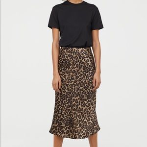 HM cheetah print satin midi skirt. Size 2, runs small. Never worn.